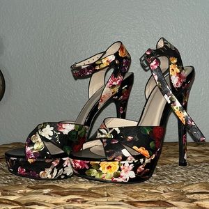 Size 7, floral heels. Worn once to wedding.